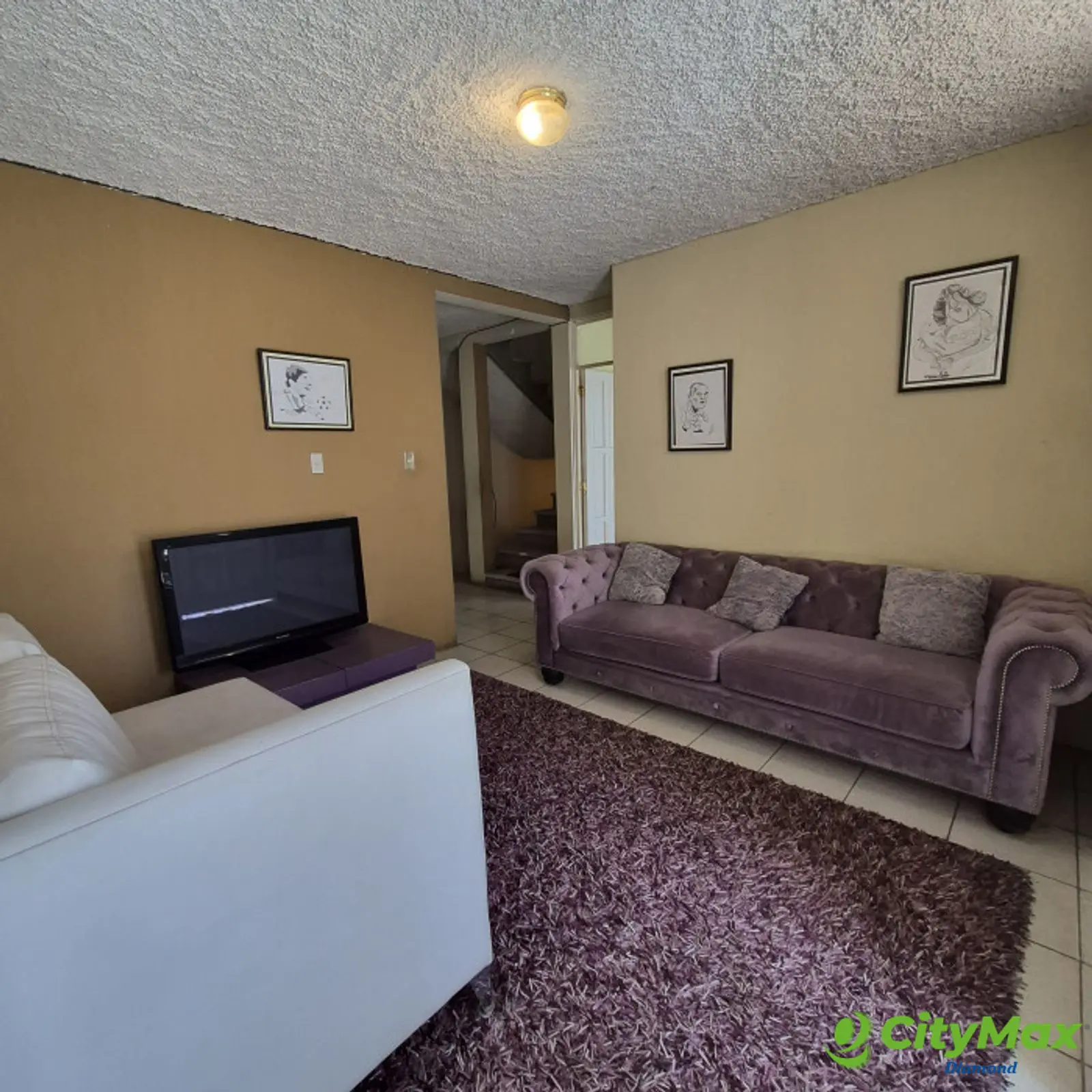 Casa en venta en Bosques de San Nicolás zona 4 Mixco - sala familiar